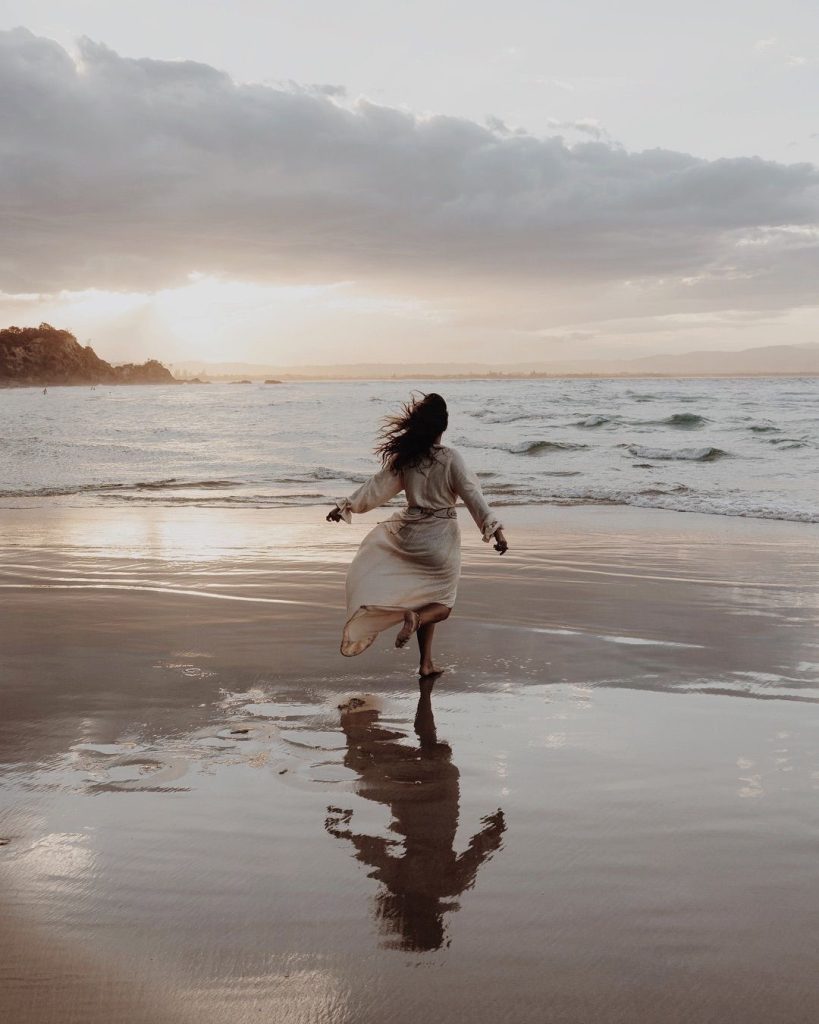 Woman running on the beach